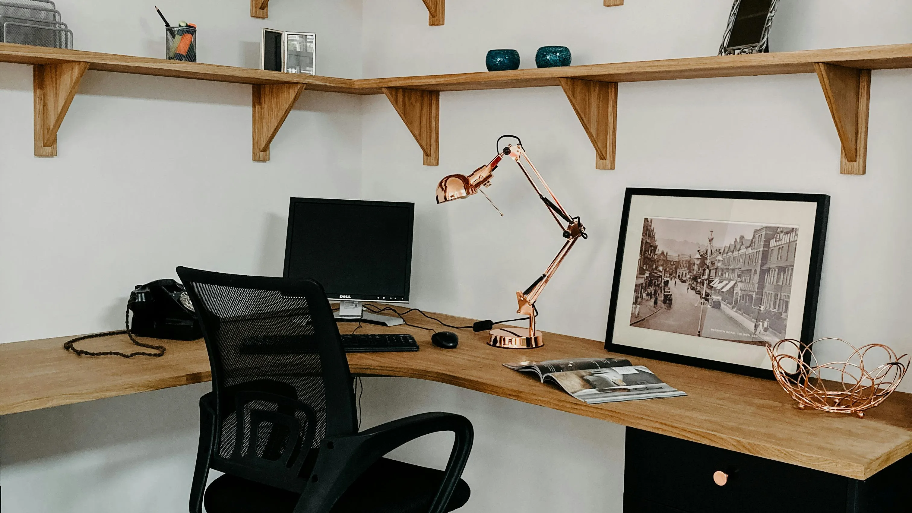 a photo showing an l-shaped or corner gaming desk