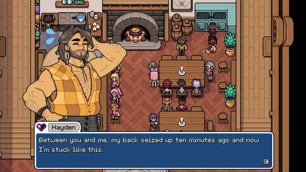 A gameplay screenshot of Fields of Mistria, showing the Friday Night at the Inn event where all townspeople gather to play games and chat; the screenshot is showing Hayden talking about other people painting him